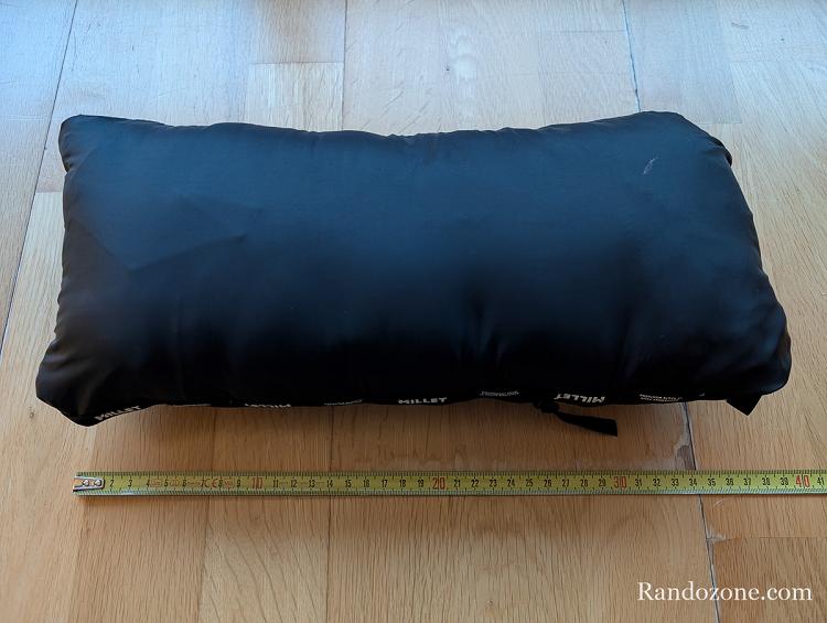 Doudoune Millet Evole Down 700 repliée dans sa poche Doudoune Millet Evole Down 700 repliée dans sa poche